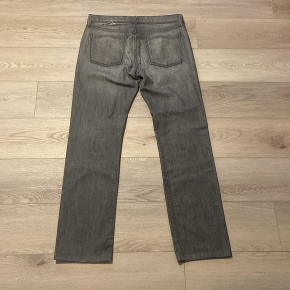 This pair of j brand jeans, are in decent condition and comes in a light grey. - Picture 2 of 3